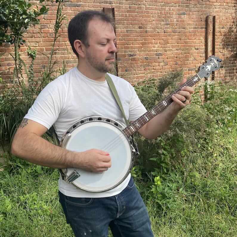 Charley Beller playing banjo